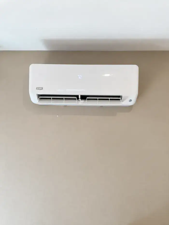 A wall-mounted ductless mini-split indoor head unit